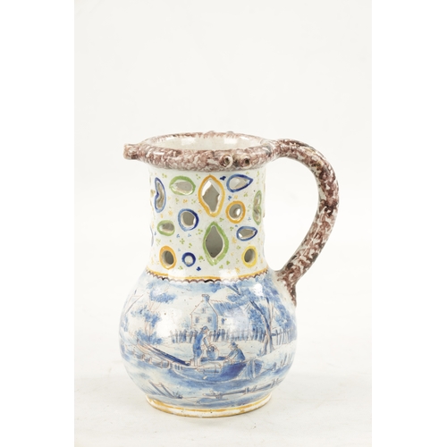 484 - AN 18TH CENTURY DUTCH DELFTWARE PUZZLE JUG with polychrome decoration and blue and white landscape s... 