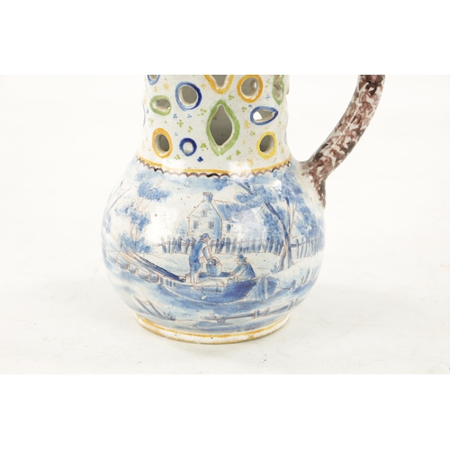 484 - AN 18TH CENTURY DUTCH DELFTWARE PUZZLE JUG with polychrome decoration and blue and white landscape s... 