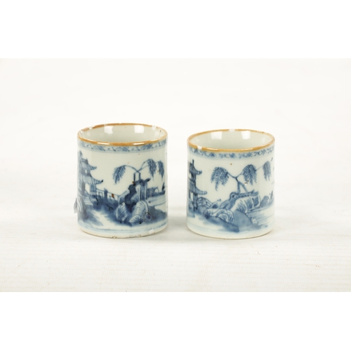 490 - A PAIR OF 18TH CENTURY CHINESE BLUE AND WHITE MUGS decorated with landscapes scenes (6.5cm high)