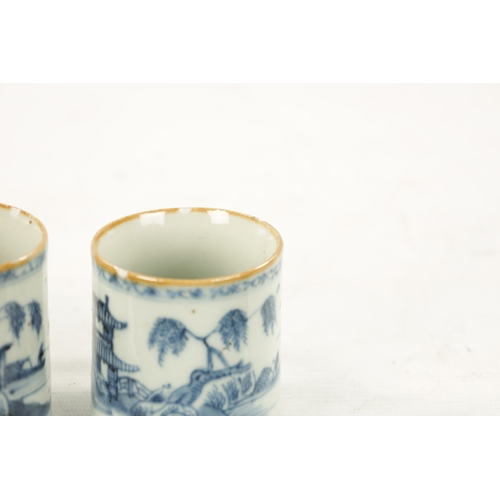 490 - A PAIR OF 18TH CENTURY CHINESE BLUE AND WHITE MUGS decorated with landscapes scenes (6.5cm high)