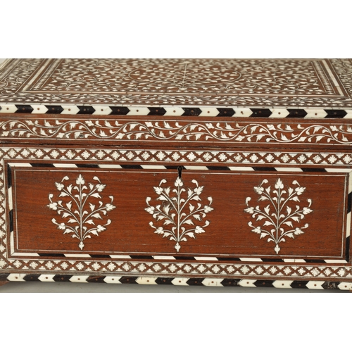 493 - A LARGE LATE 19TH CENTURY ANGLO-INDIAN IVORY AND EBONY INLAID WORKBOX with fine scrolling branch wor... 