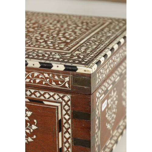 493 - A LARGE LATE 19TH CENTURY ANGLO-INDIAN IVORY AND EBONY INLAID WORKBOX with fine scrolling branch wor... 