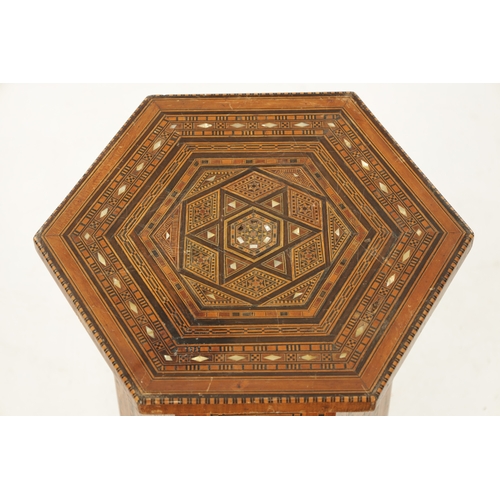 494 - A 19TH CENTURY EASTERN OTTOMAN STYLE INLAID OCCASIONAL TABLE with geometrically designed panels (33c... 