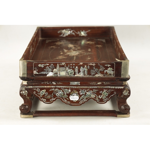 500 - A 19TH CENTURY CHINESE HARDWOOD AND MOTHER OF PEARL INLAID TRAY ON STAND decorated with landscapes. ... 