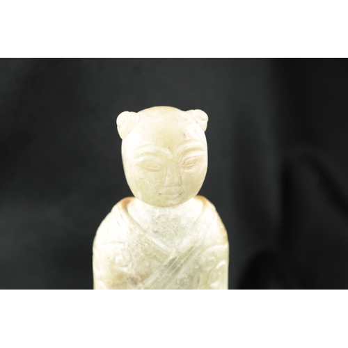 501 - A CHINESE CARVED JADE RELIGIOUS FIGURE From the estate of William Arthur BlackburnFrom the estate of... 