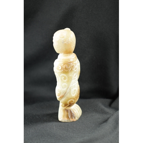 501 - A CHINESE CARVED JADE RELIGIOUS FIGURE From the estate of William Arthur BlackburnFrom the estate of... 