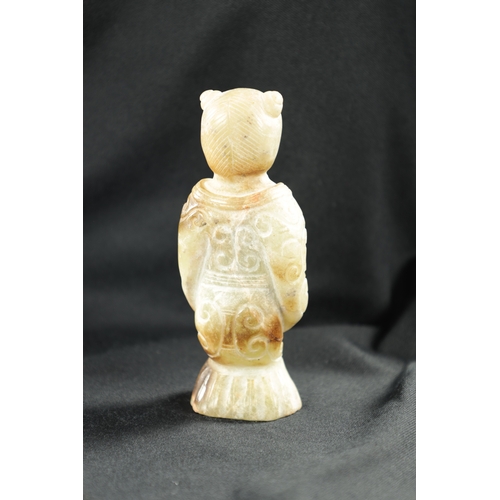 501 - A CHINESE CARVED JADE RELIGIOUS FIGURE From the estate of William Arthur BlackburnFrom the estate of... 