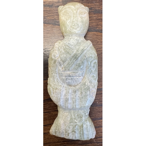 501 - A CHINESE CARVED JADE RELIGIOUS FIGURE From the estate of William Arthur BlackburnFrom the estate of... 