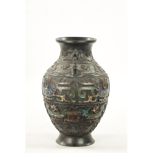 502 - A CHINESE BRONZE AND CLOISONNE ENAMEL VASE decorated with dragon, birds and flowers. (30.5cm high)