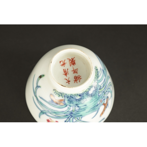 503 - A SMALL CHINESE QING DYNASTY DOCAI PORCELAIN ORCHID FLOWER CUP decorated with orchids and butterflie... 