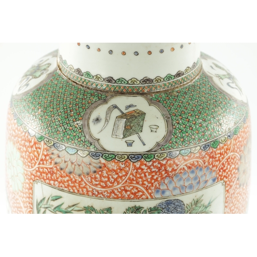 505 - A LARGE 18TH CENTURY CHINESE FAMILLE VERTE PORCELAIN VASE having panelled body depicting birds perch... 