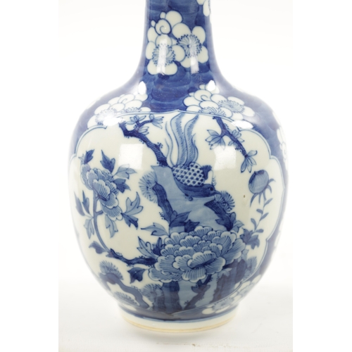 517 - A 19TH CENTURY CHINESE BLUE AND WHITE BOTTLENECK VASE with prunus pattern ground and floral panels. ... 