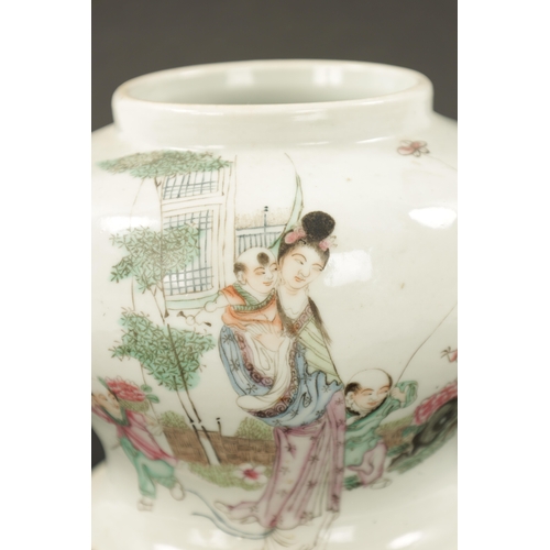 518 - A 19TH CENTURY CHINESE SQUAT BULBOUS VASE decorated with an oriental lady and children (13cm high )