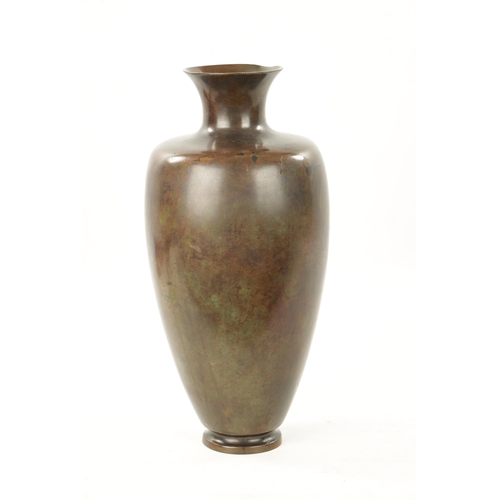 520 - A LARGE JAPANESE MEIJI PERIOD PATINATED BRONZE VASE with raised decoration depicting a crane perched... 