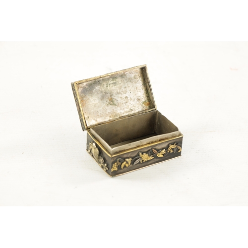 521 - A SMALL JAPANESE MEIJI PERIOD GOLD INLAID AND MIXED METAL BRONZE BOX with figural pagoda scenes to t... 