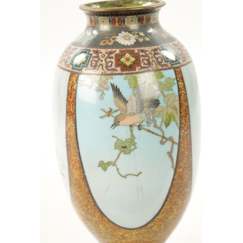 522 - A FINE JAPANESE MEIJI PERIOD CLOISONNE VASE decorated with birds and fish in shaped panels (22cm hig... 