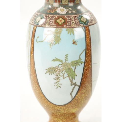 522 - A FINE JAPANESE MEIJI PERIOD CLOISONNE VASE decorated with birds and fish in shaped panels (22cm hig... 