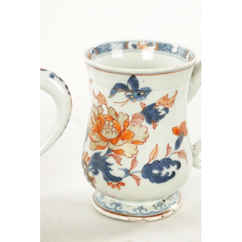 524 - A PAIR OF 18TH CENTURY CHINESE IMARI TANKARDS of baluster form decorated with flowering branchwork, ... 