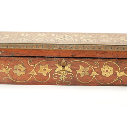 525 - A 19TH CENTURY ANGLO INDIAN BRASS INLAID HARDWOOD PEN AND INK BOX with fitted interior. (29cm wide)