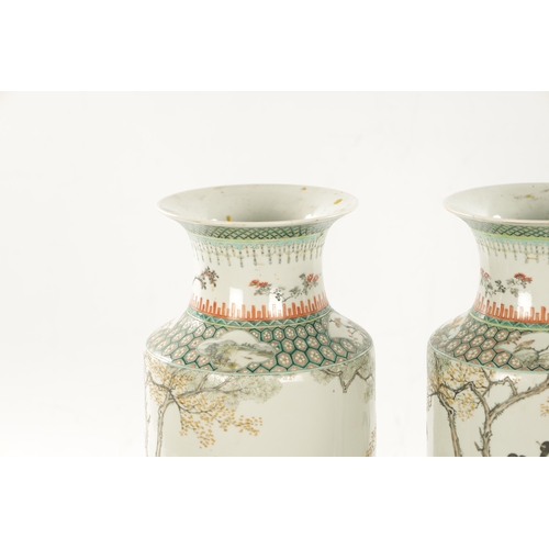 536 - A PAIR OF CHINESE REPUBLIC FAMILLE VERTE CYLINDRICAL VASES decorated with figures in landscape setti... 