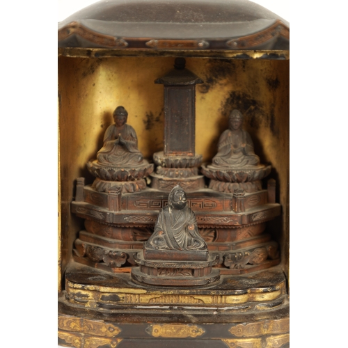 538 - A 19TH CENTURY BLACK LACQUER BUDDHIST TRAVELLING PRAYER SHRINE with double folding front and gilt in... 