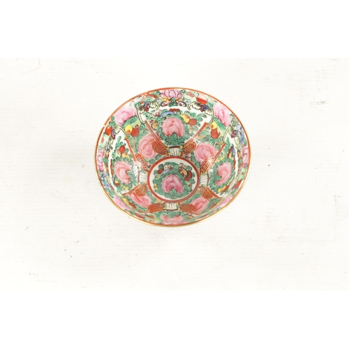 541 - A 20TH CENTURY CHINESE EXPORT FAMILLE ROSE SMALL RICE BOWL decorated with rose medallions amongst a ... 