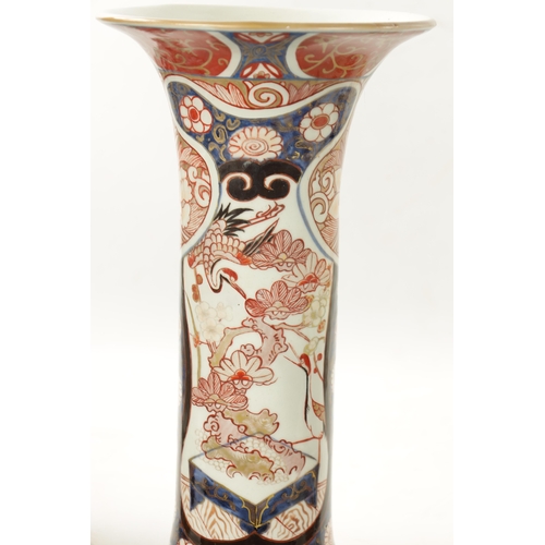 549 - A SUITE OF FIVE 18TH CENTURY JAPANESE EDO PERIOD IMARI VASES decorated with storks in landscape sett... 