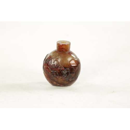 551 - A CHINESE CARVED RUSSET JADE SNUFF BOTTLE carved with an immortal and monkey, deer and bat to revers... 