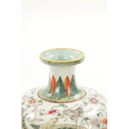 555 - A 19TH CENTURY CHINESE FAMILLE ROSE BULBOUS VASE OF SMALL SIZE decorated with a Dragon amongst flora... 