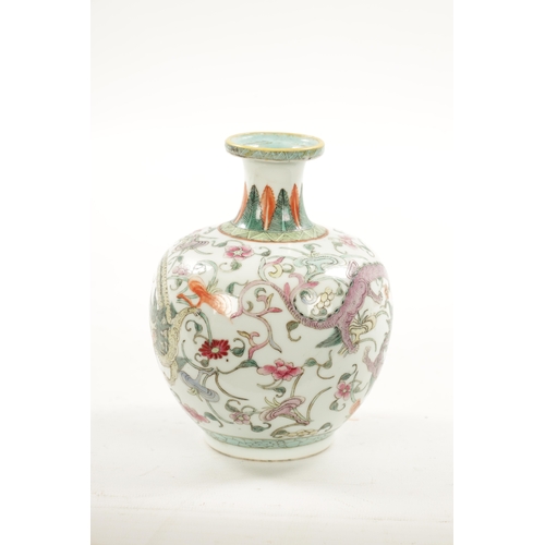 555 - A 19TH CENTURY CHINESE FAMILLE ROSE BULBOUS VASE OF SMALL SIZE decorated with a Dragon amongst flora... 