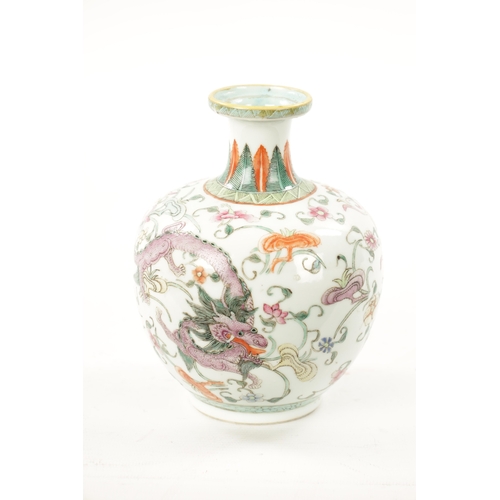 555 - A 19TH CENTURY CHINESE FAMILLE ROSE BULBOUS VASE OF SMALL SIZE decorated with a Dragon amongst flora... 