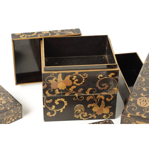 558 - A COLLECTION OF FIVE JAPANESE MEIJI PERIOD LACQUER WORK BOXES decorated with gilt scrolling floral d... 