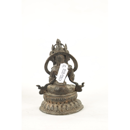 568 - A 19TH CENTURY INDIAN TIBETAN BRONZE FIGURE OF A SEATED BUDDHA (12cm high)