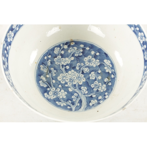 570 - A LARGE 19TH CENTURY CHINESE BLUE AND WHITE PORCELAIN PRUNUS BOWL all-over decoration of entwined br... 