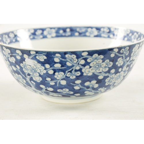 570 - A LARGE 19TH CENTURY CHINESE BLUE AND WHITE PORCELAIN PRUNUS BOWL all-over decoration of entwined br... 