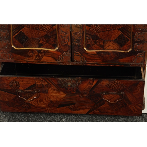 575 - A JAPANESE MEIJI PERIOD INLAID COLLECTOR'S CABINET OF LARGE SIZE with hinged doors revealing small d... 