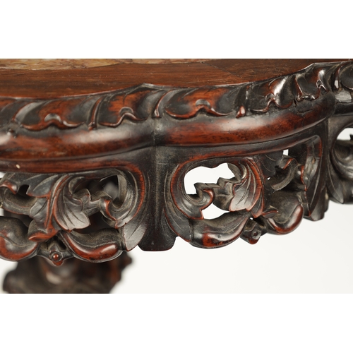 577 - A GOOD 19TH CENTURY CHINESE CARVED HARDWOOD MARBLE TOPPED OCCASIONAL TABLE with inset veined marble ... 