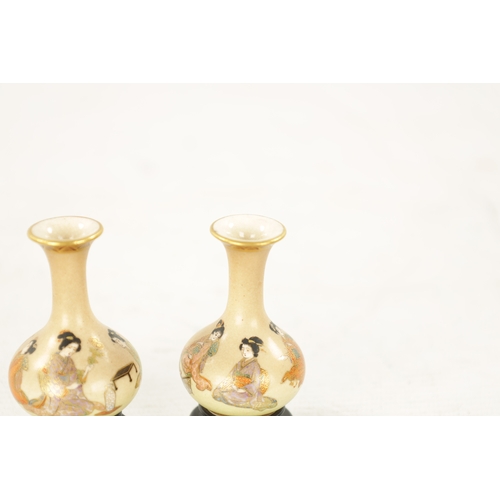 580 - A PAIR OF FINE JAPANESE MEIJI PERIOD SATSUMA MINIATURE BOTTLE VASES having finely decorated figures ... 