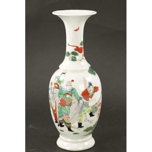 588 - A 19TH CENTURY CHINESE FAMILLE VERTE VASE with figures in a garden setting (25cm high )