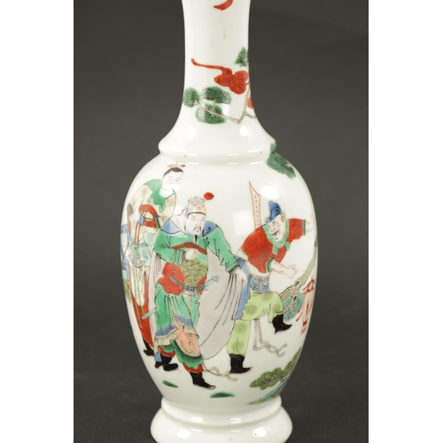 588 - A 19TH CENTURY CHINESE FAMILLE VERTE VASE with figures in a garden setting (25cm high )