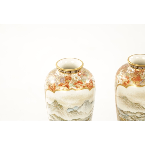 592 - YABU MEIZAN (1853-1934) A FINE PAIR OF MEIJI PERIOD JAPANESE SATSUMA VASES decorated on the slender ... 