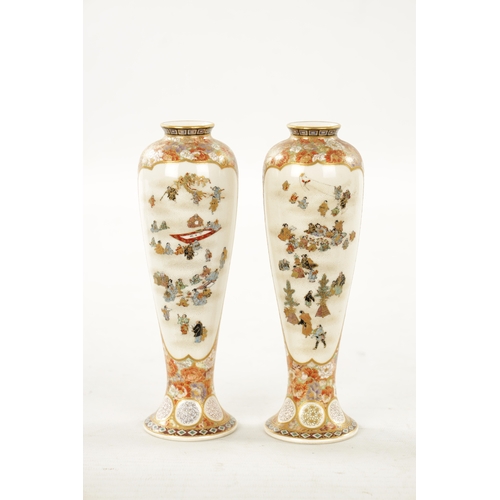 592 - YABU MEIZAN (1853-1934) A FINE PAIR OF MEIJI PERIOD JAPANESE SATSUMA VASES decorated on the slender ... 