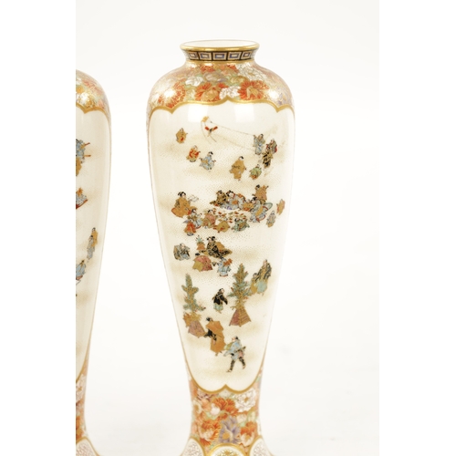 592 - YABU MEIZAN (1853-1934) A FINE PAIR OF MEIJI PERIOD JAPANESE SATSUMA VASES decorated on the slender ... 