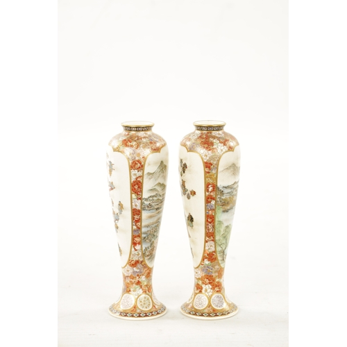 592 - YABU MEIZAN (1853-1934) A FINE PAIR OF MEIJI PERIOD JAPANESE SATSUMA VASES decorated on the slender ... 