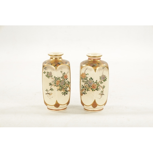 596 - A FINE PAIR OF JAPANESE MEIJI PERIOD SATSUMA CABINET VASES of hexagonal slender shape decorated with... 