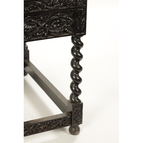 608 - A GOOD 18TH CENTURY CARVED INDIAN COROMANDEL COAST EBONY ARMCHAIR with leaf carved frame, barley twi... 