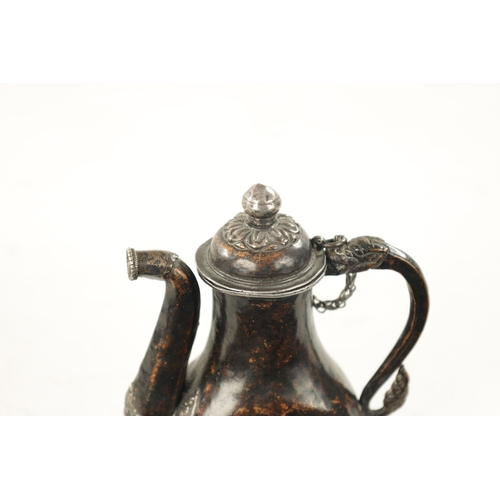 617 - A 19TH CENTURY MINIATURE EASTERN MIXED METAL EWER with a calligraphic symbol on each side and dragon... 