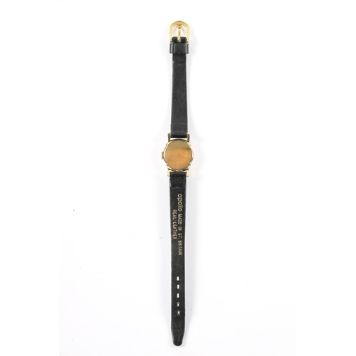 640 - A LADIES OMEGA WRISTWATCH on black leather strap, the rolled gold case enclosing an unusual black ho... 