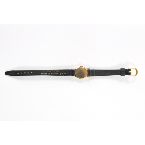 640 - A LADIES OMEGA WRISTWATCH on black leather strap, the rolled gold case enclosing an unusual black ho... 