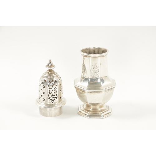 667 - A GEORGE II SILVER SUGAR CASTER of crested faceted baluster form, domed cover and turned finial. Lon... 